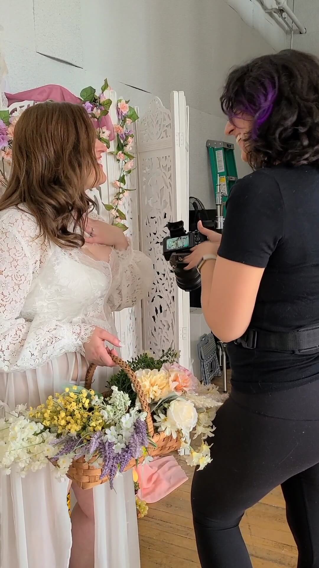 Client reacting to seeing boudoir photos for the first time